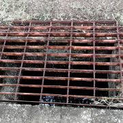 frp is alternative to steel grating - dangerous warped sharp open area rusty steel grating